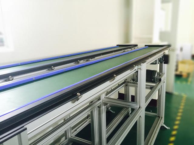 皮带输送机 广泛运用於工厂中免治具工件之输送,并依其负载重量设计